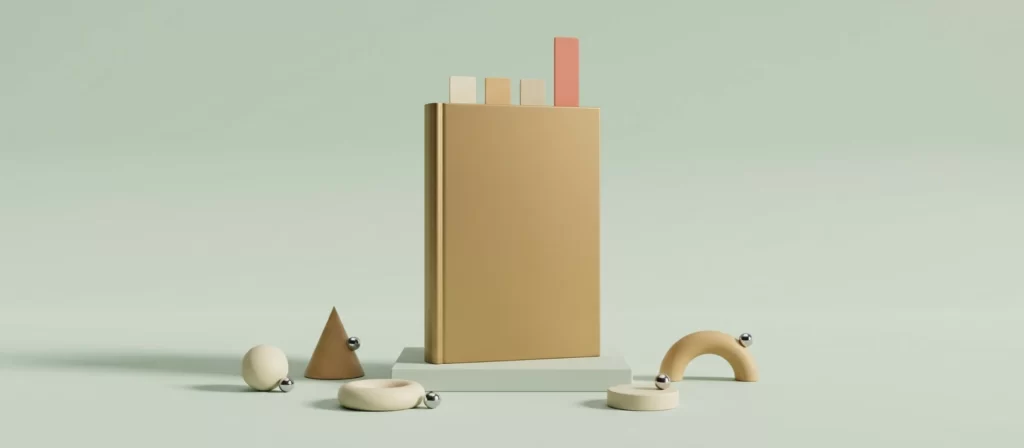 Libro de latón de pie sobre un pedestal, con cuatro marcadores; el coral sobresale más