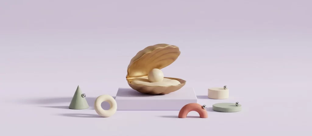 Ostra de latón entreabierta con una perla crema sobre un pedestal bajo, entre formas de arcilla